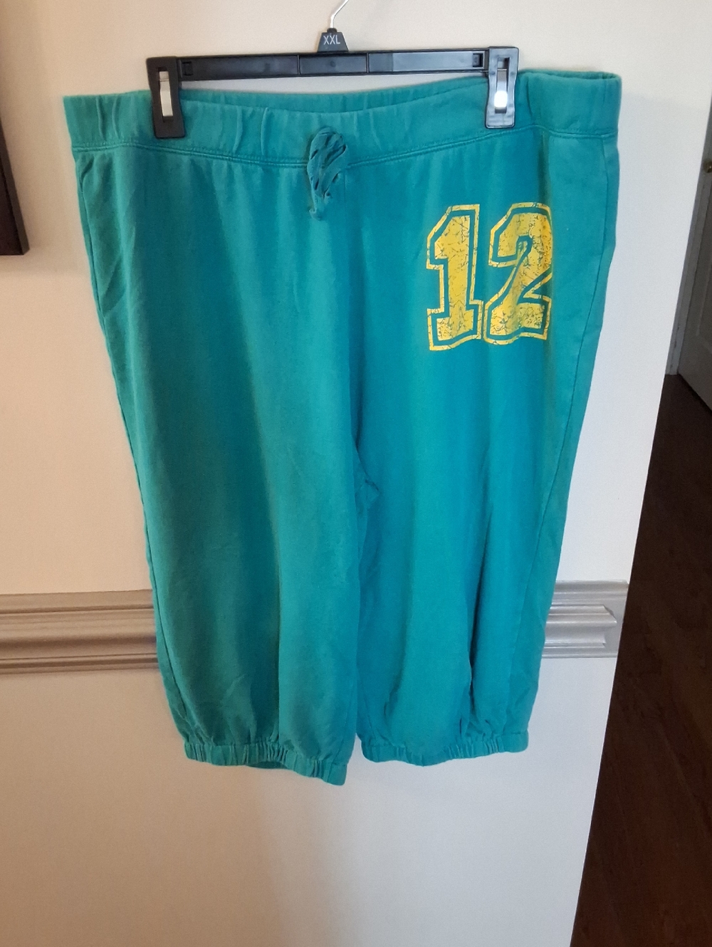 Lane Bryant Teal Capris with Yellow '12' Graphic